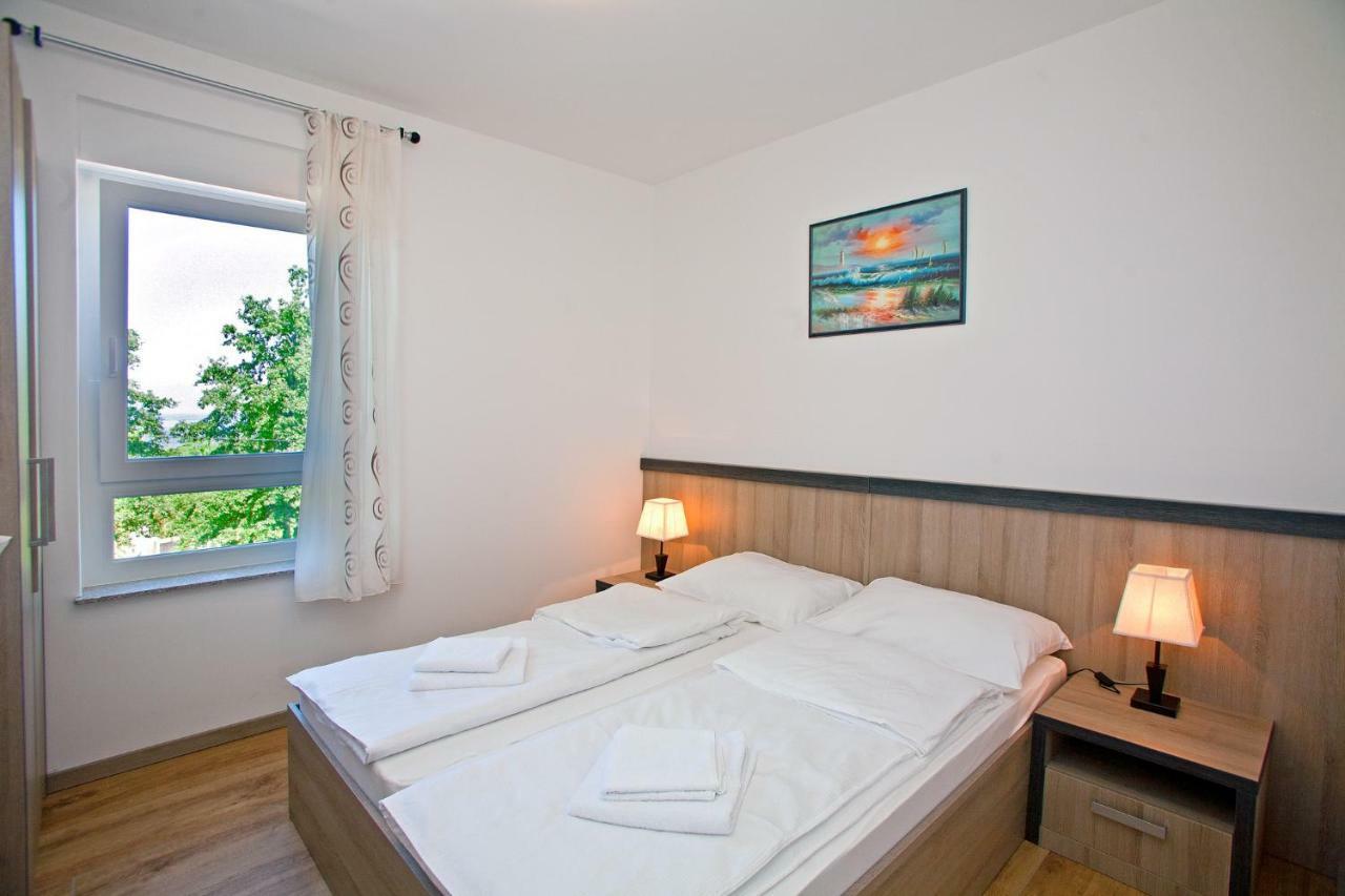 Apartments Maslina II Njivice Esterno foto
