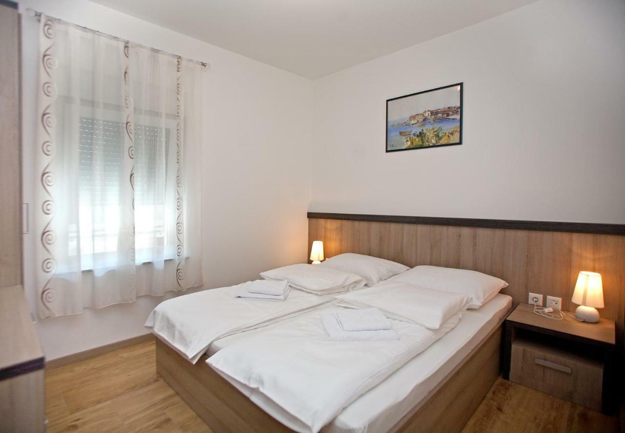 Apartments Maslina II Njivice Esterno foto